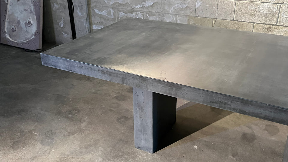 Monolithic Concrete Dining Table – Minimalist Architectural Trestle