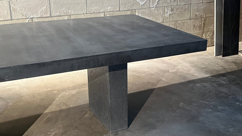 Monolithic Concrete Dining Table – Minimalist Architectural Trestle