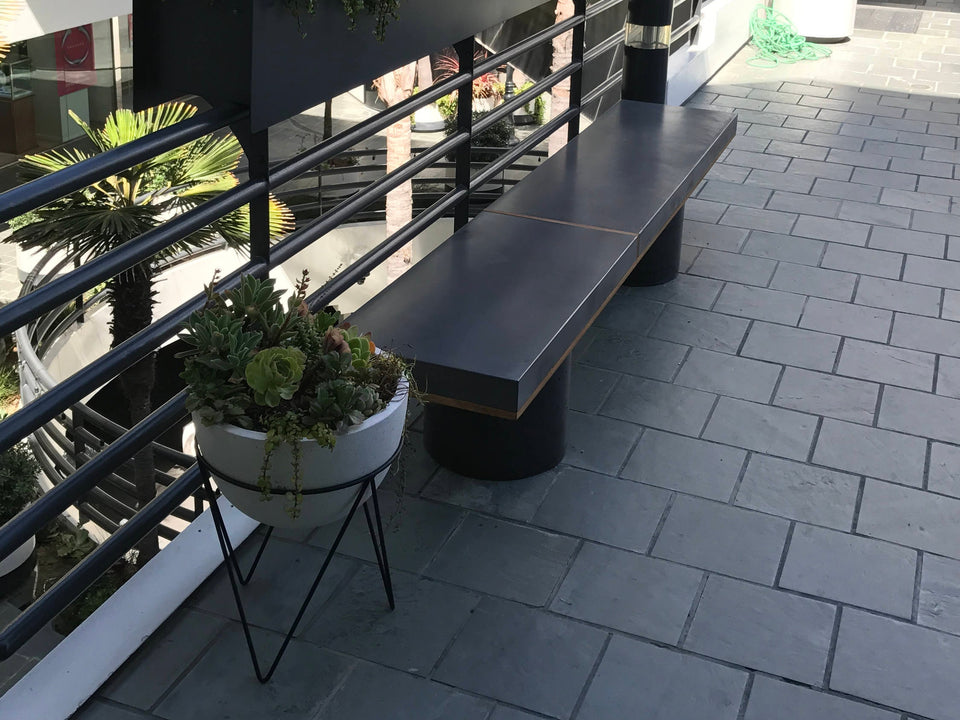 Concrete Column Bench Charcoal Concrete, Red wood Detail 76-inch long Shown outdoors