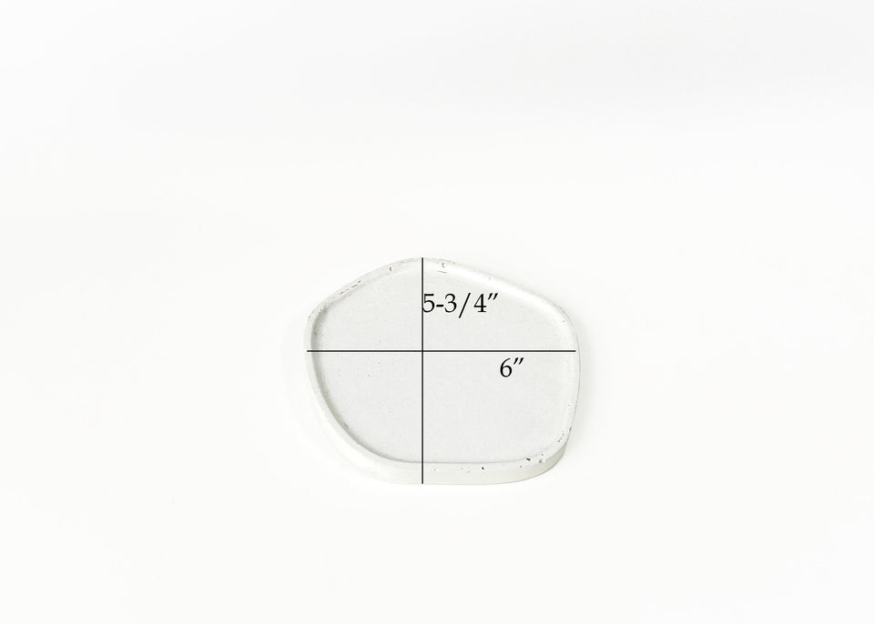 small Off-White Organic shaped tray tray pictured with dimensions 5.75 inches long, 6 inches wide